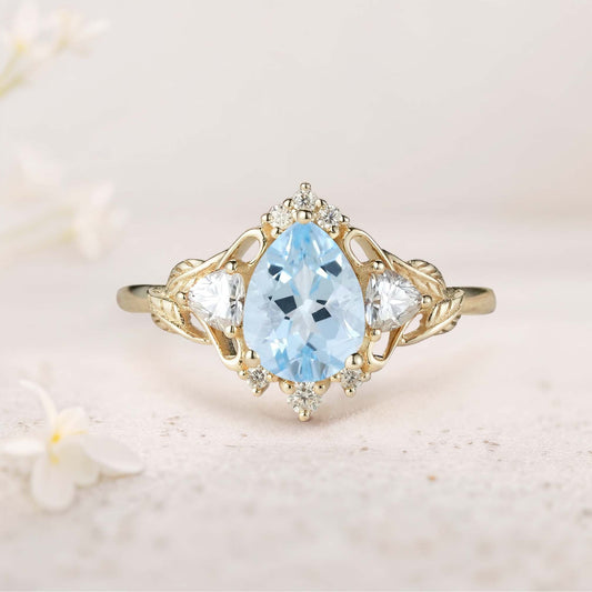 Unique floral engagement rings Pear Aquamarine and Moissanite side stones Leaf Ring Engagement Ring