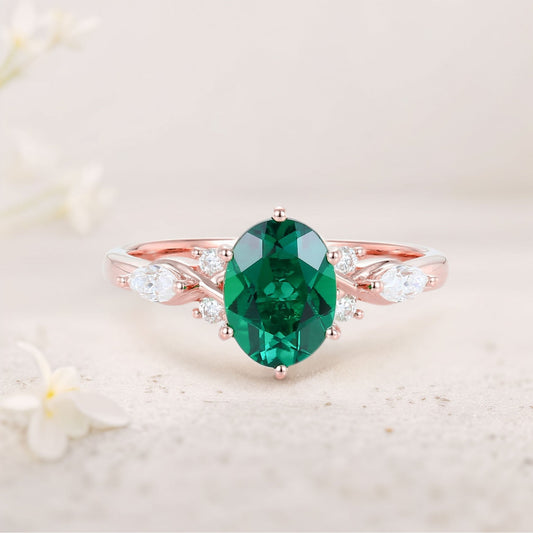 Unique Oval Emerald Split Shank Engagement Ring