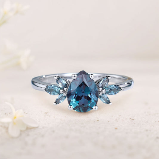 Unique Pear Lab Alexandrite Engagement Ring with Petal Accents