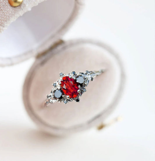 Unique Celeste Rose Three Stone Oval Garnet and Black Moissanite Anniversary Ring