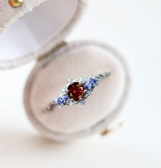 Unique Celeste Rose Three-Stone Round Garnet Anniversary Ring