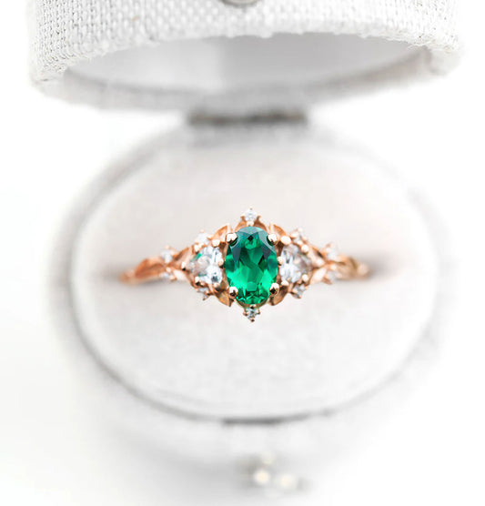 Unique Floral Rose Three Stone Oval Lab Emerald Ring