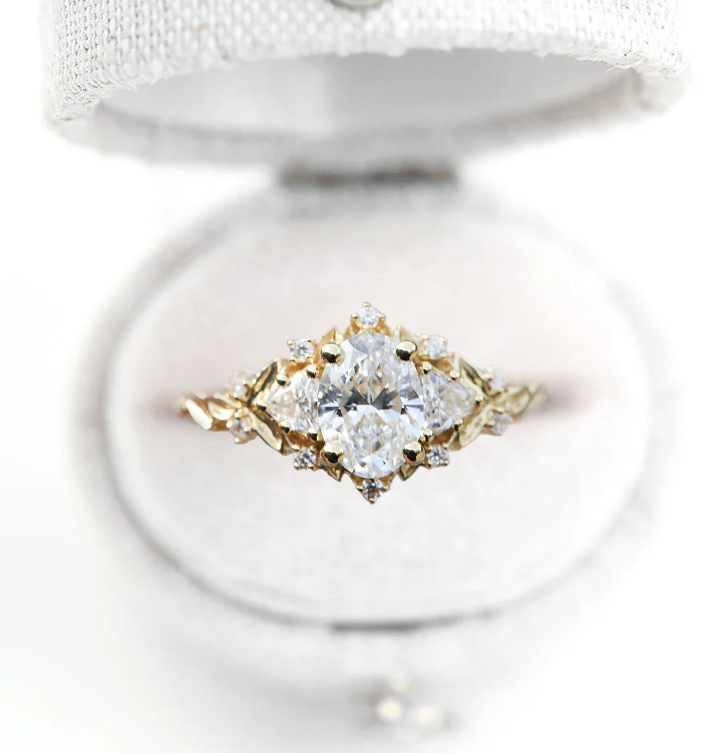 Unique Briar Rose Three Stone Oval Moissanite Ring