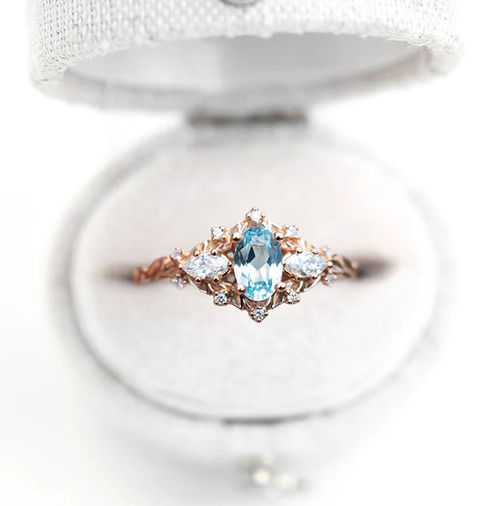 Unique Floral Rose Three Stone Oval Topaz Ring