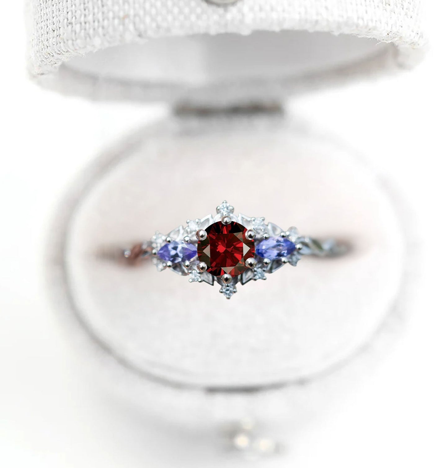 Unique Celeste Rose Three-Stone Round Garnet Anniversary Ring