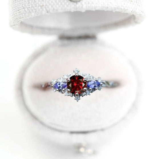 Unique Celeste Rose Three-Stone Round Garnet Anniversary Ring