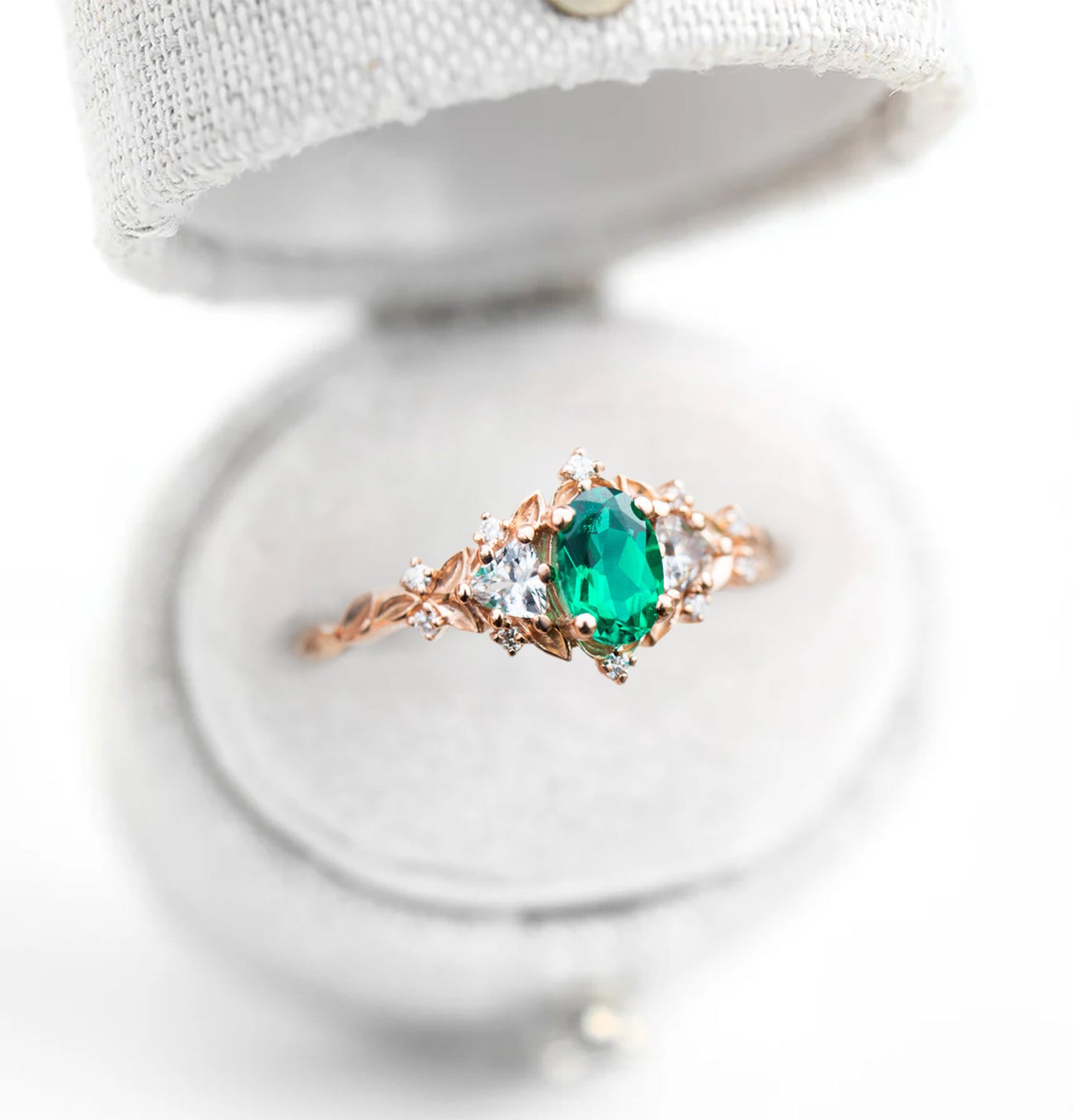 Unique Floral Rose Three Stone Oval Lab Emerald Ring