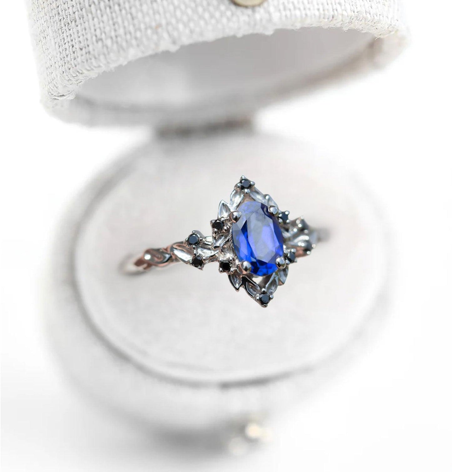 Unique Floral Rose Oval Lab Sapphire and Black Moissanite Ring