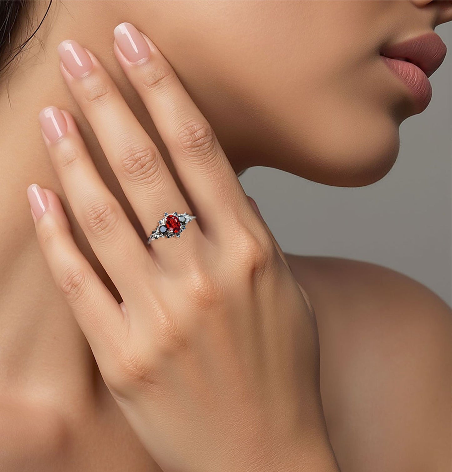 Unique Celeste Rose Three Stone Oval Garnet and Black Moissanite Anniversary Ring