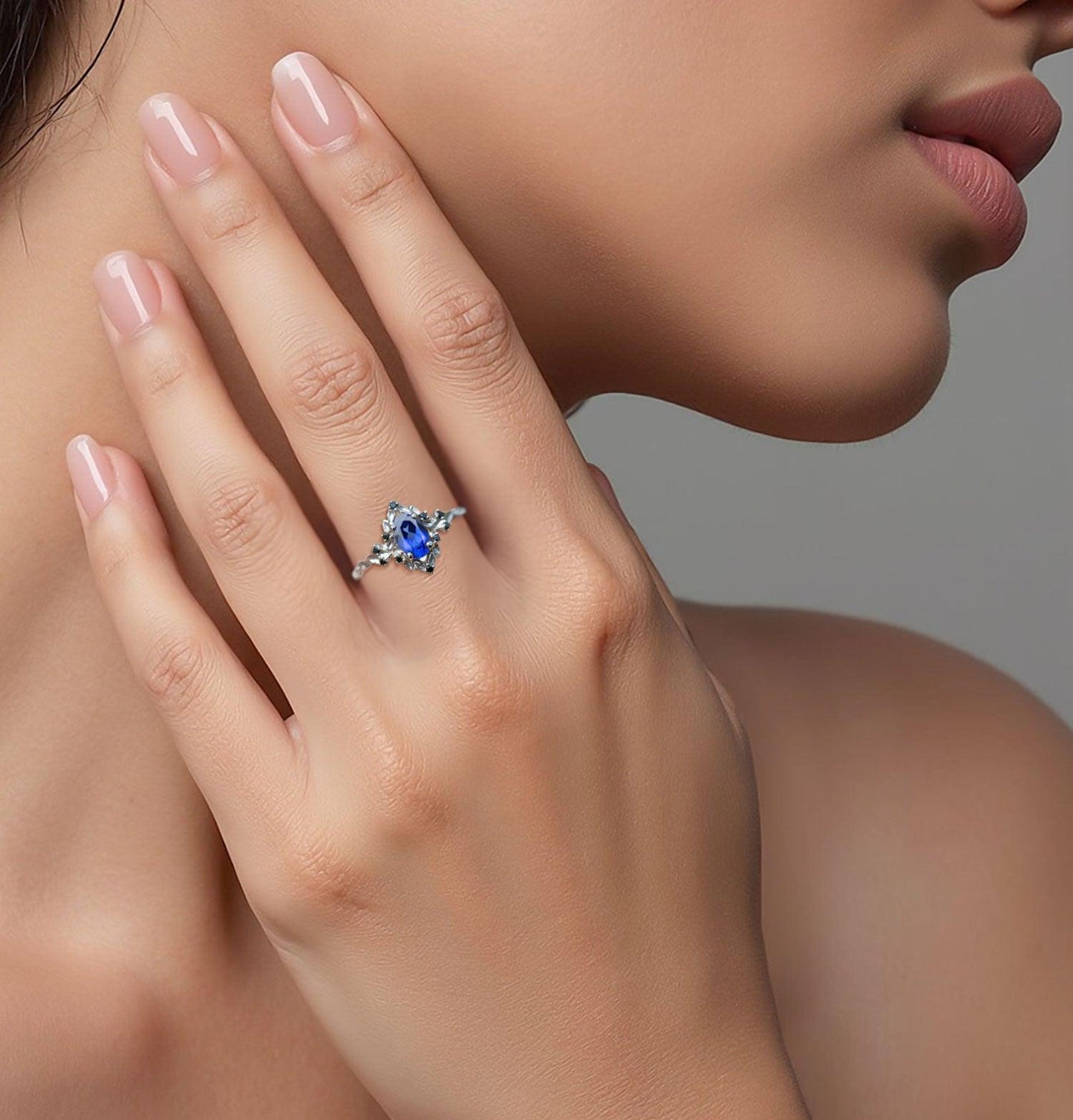 Unique Floral Rose Oval Lab Sapphire and Black Moissanite Ring