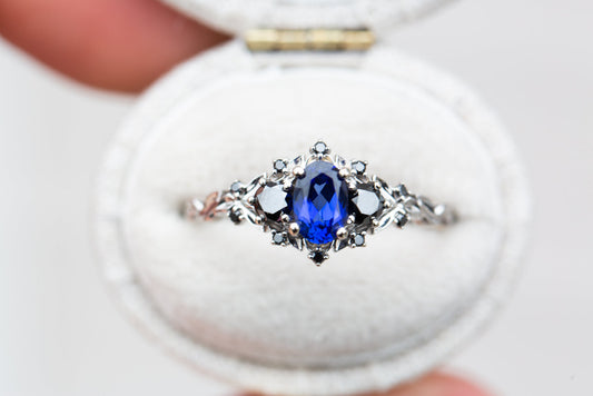 Unique Floral Rose Three Stone Oval Lab Blue Sapphire and Black Moissanite Ring