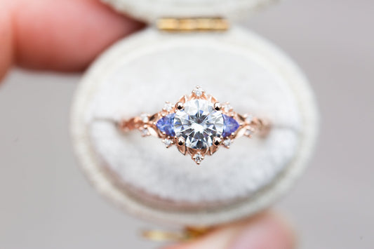 Unique Celeste Rose Three Stone Round Moissanite Ring
