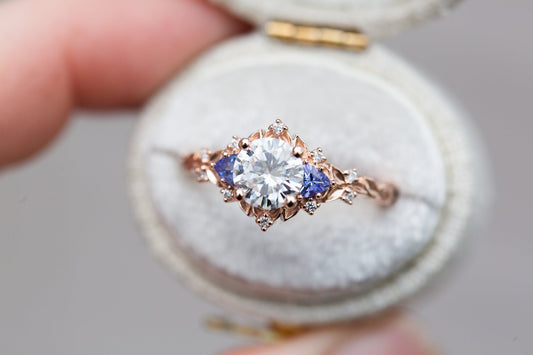 Unique Celeste Rose Three Stone Round Moissanite Ring