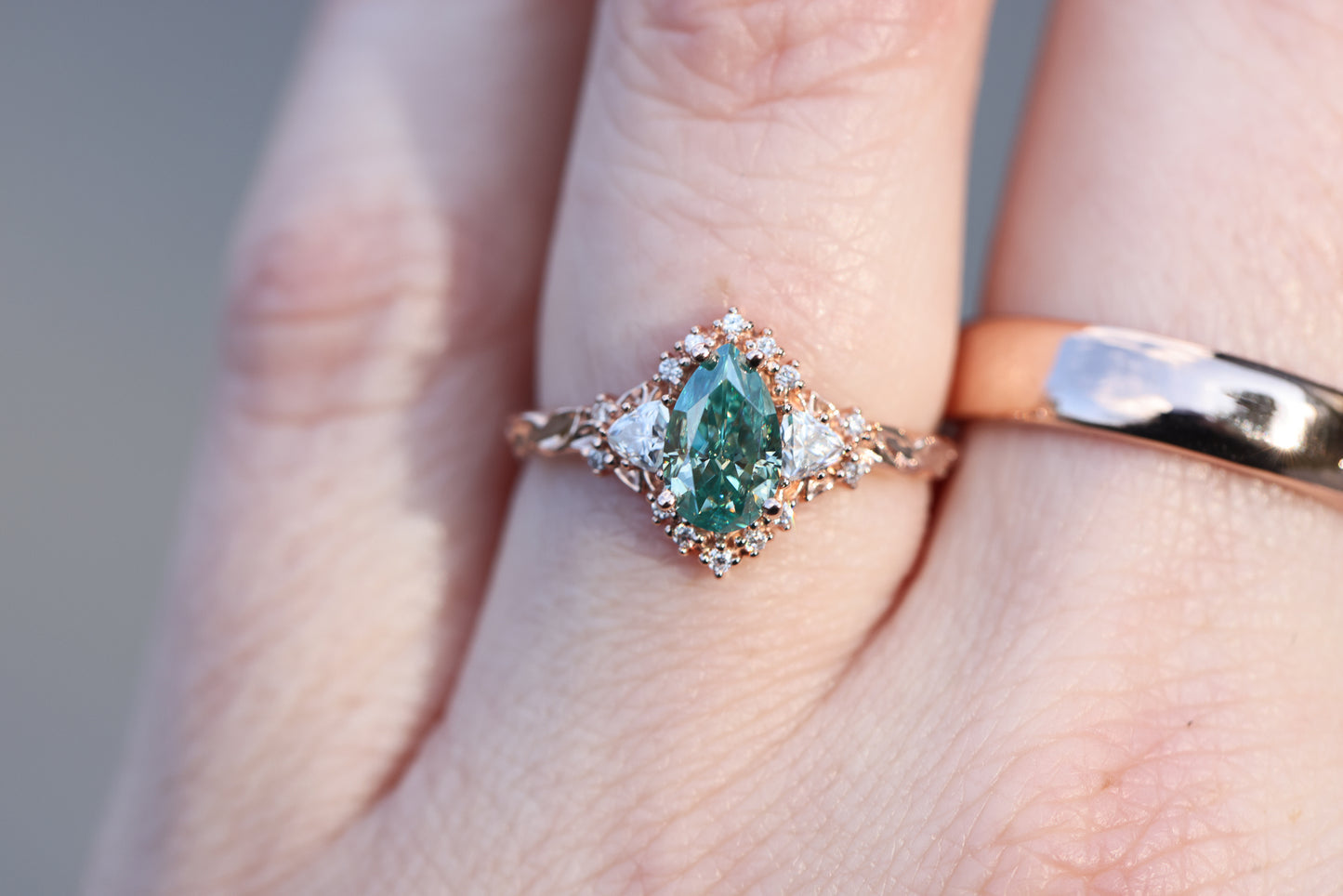 Unique Briar Half Halo Pear Teal Moissanite Ring