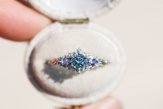 Unique Celeste Rose Three Stone Round Lab Aquamarine Ring