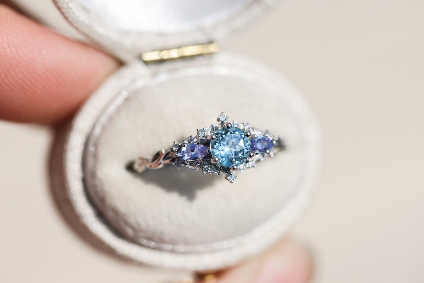Unique Celeste Rose Three Stone Round Lab Aquamarine Ring