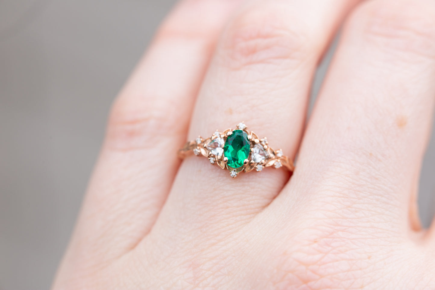 Unique Floral Rose Three Stone Oval Lab Emerald Ring