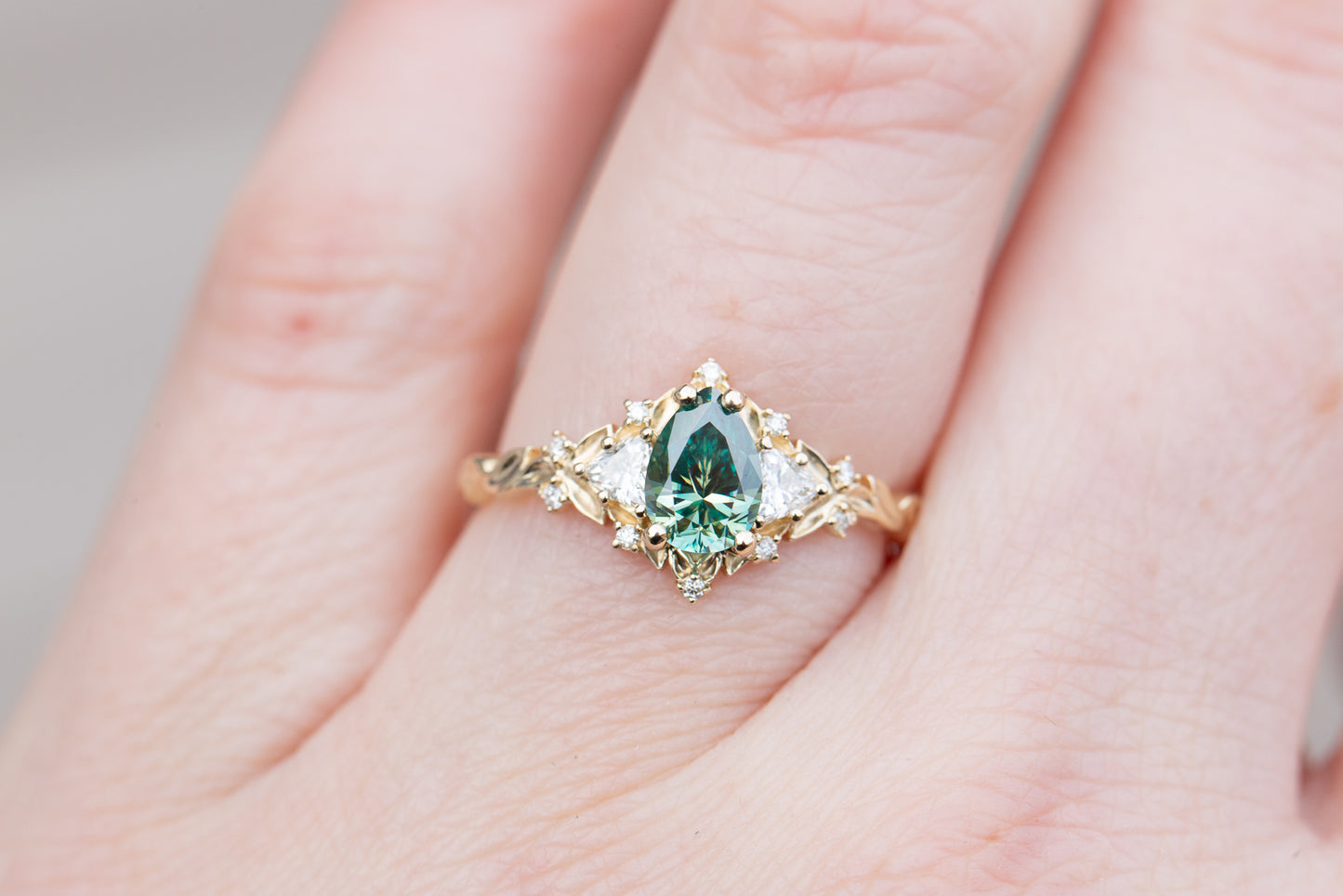 Unique Celeste Rose Three Stone Pear Teal Moissanite Ring